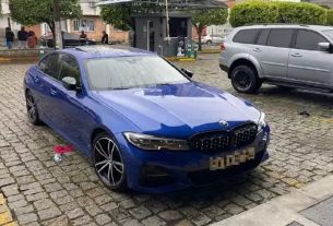 BMW estacionada em rodoviária de Balneário Camboriú onde corpos foram achados. (Foto: Reprodução)